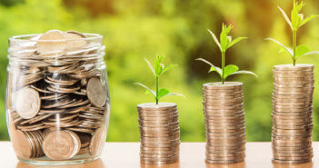 How Much Should It Cost to Plant a New Church? Jar of coins beside growing stacks of coins with seedlings sprouting from the top