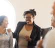 Smiling people in a church meeting