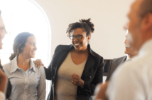 Smiling people in a church meeting