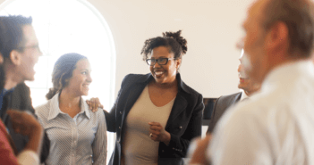 3 Big Mistakes in Making Church Policies Smiling people in a church meeting
