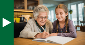 Younger person and older person working together