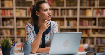 Struggling with What to Write in the Church Newsletter? Pastor in front of a computer trying to think of what to write